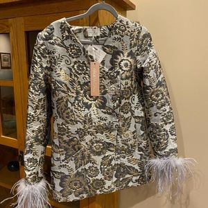 Alice McCall Dress
V Neckline With Five Front Button Closures And Long Sleeves.